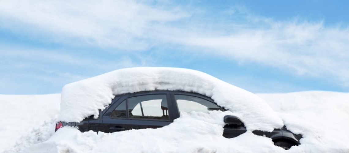 Car Covered in Snow